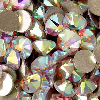 Flatback Crystal AB rhinestones with a 16-facet (8+8) cut and metallic foil backs scattered in a shimmering pile.