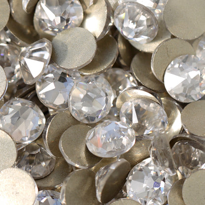 Clear flatback rhinestones with a 16-facet (8+8) cut and metallic foil backs forming a sparkling pile.