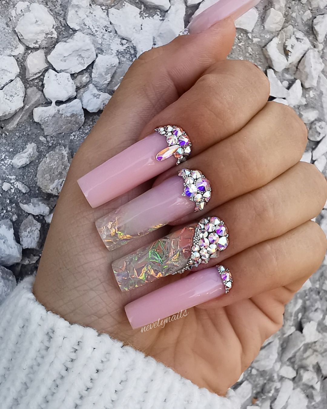 Long pink coffin nails with crystal clusters and glitter accents, showing how Eunails rhinestones can create glamorous 3D nail art inspiration