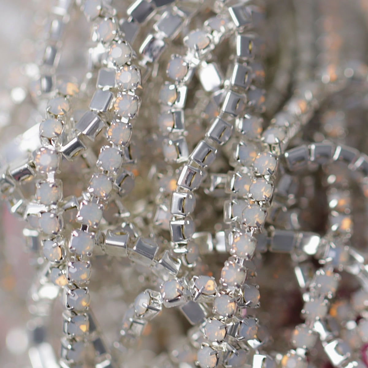 Silver rhinestone chain set with soft Light Rose Opal stones bulk picture